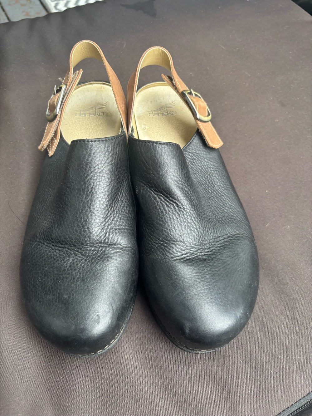 Dansko Black Leather Slingback Clogs with Tan Strap
